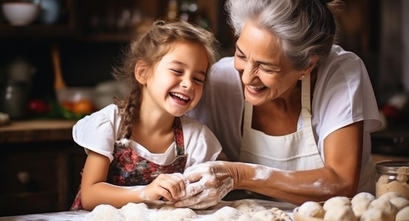 grandmother baking cookies with her granddaughter